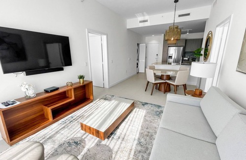 Doral Apartment | Modern 2BR Golf-View Suite | Pool, Massage & Sauna