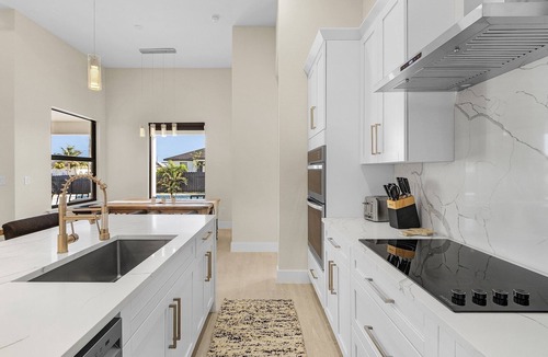 Burnt Store House | Modern 4-bed home with private heated pool, outdoor bar and grill in Cape Coral!