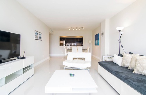 Sunny Isles Beach Condo | Modern condo w/bay views. WiFi, parking, tennis, playground and more!