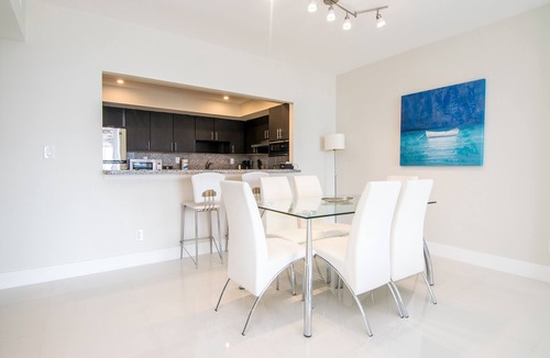 Sunny Isles Beach Condo | Modern condo w/bay views. WiFi, parking, tennis, playground and more!