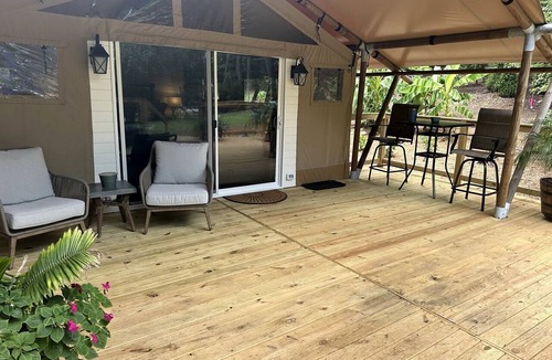 Taylorsville RV Rental | Modern Fully Equipped Safari Tent with Spacious Deck in North Carolina