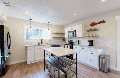 Sylva House | Mountain view home with fire-pit with beautiful view of the creek