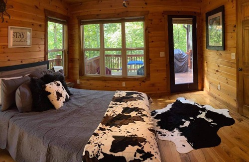 Morganton Cabin | Mountain views located on private lake all wood 3 story cabin.