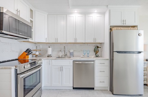 Panama City Beach Apartment | MY HAPPY PLACE TOO! BEACHFRONT! PATIO! FREE BEACH CHAIRS MARCH 1-OCTOBER 31