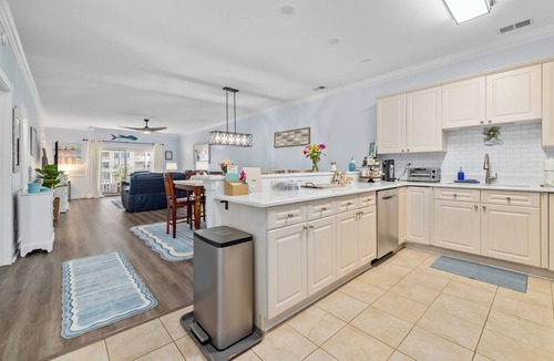 Central Myrtle Beach Condo | Myrtle Beach 3BR w/Lake & Pool Views + Golf
