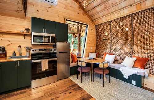 Sugarfork Cabin | Nest-Shaped Cocoon Treehouse on 4 Trees - The Marsu