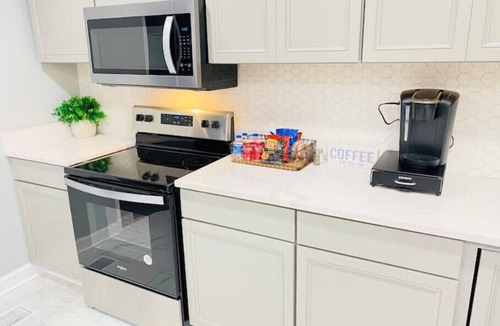 Covington House | “New Listing” The Latest Luxurious Blue Cheetah! 4Bed 3Bath