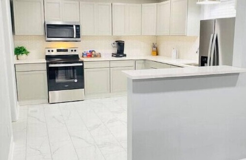 Covington House | “New Listing” The Latest Luxurious Blue Cheetah! 4Bed 3Bath