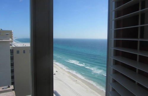 Long Beach Condo | New Rules for parking garage. 40.00 dollars per vehicle per reservation.