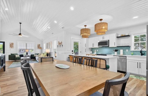 Tranquil Harbour House | Oak Island Lux Cottage | Fenced Yard & Heated Pool!