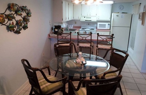 Crescent Beach Condo | OCEAN FRONT! Ground Floor End Unit! Private dock with gorgeous sunsets!