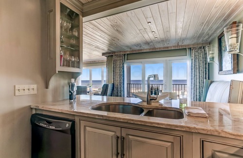 Ocean Cay Condo | Oceanfront Living at its Best! Professionally renovated and decorated with a breathtaking oceanview.