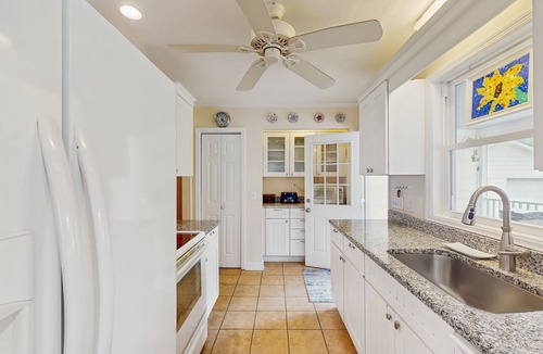 Old Village House | Old Village hideaway with covered porches, grill, alfresco dining & fenced yard