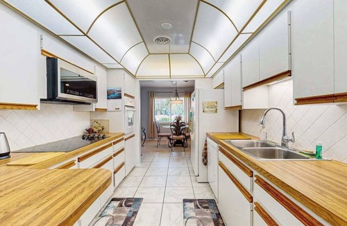 Englewood South House | Outdoor paradise on waterway with pool and spa, beach gear, and dog friendly