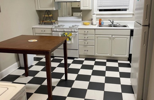 Goldsboro House | Palm Cottage - Centrally Located Brick Home on Quiet Street