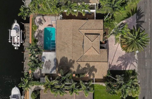 Garden Isles House | Palm Villa: New Remodel/Waterfront/Salt Water Pool!