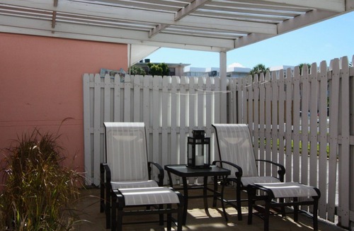 St. Pete Beach Condo | Patio Area - Walk to Beaches Shops & Restaurants