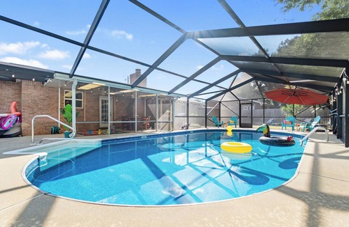 West Pensacola House | Pensacola Poolside Family Retreat w/Hot Tub & Game Room
