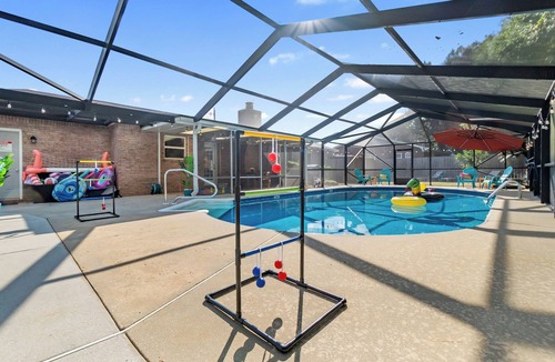 West Pensacola House | Pensacola Poolside Family Retreat w/Hot Tub & Game Room