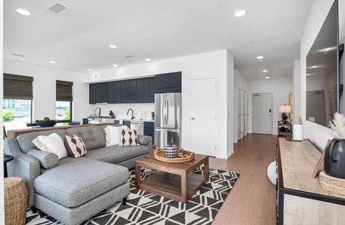 North Capitol Condo | Penthouse Condo with a River View - Walk to Downtown + Garage Parking