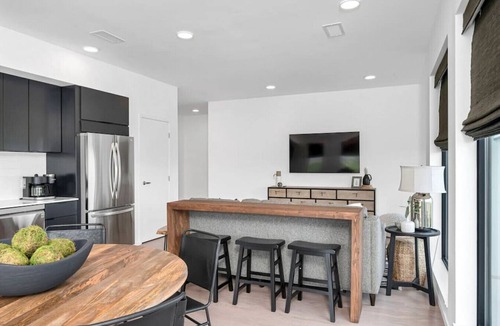 North Capitol Condo | Penthouse Condo with a River View - Walk to Downtown + Garage Parking