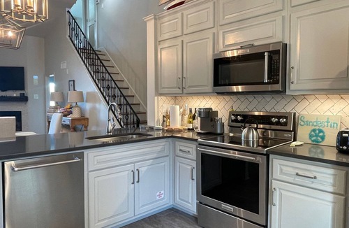 Sandestin Condo | Perfectly located home with golf cart, open layout, smart TVs, W/D, & pools
