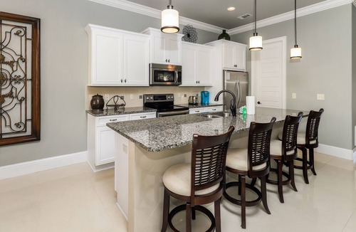 Villa Lago House | Pet Friendly ~ Water View ~ 2 Golf Carts ~ Community Pool