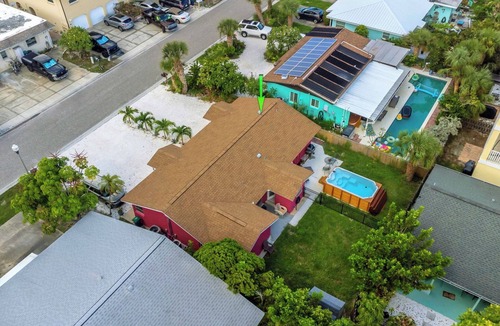 Redington Shores House | Pink Beach House on Barrier Island with a POOL!