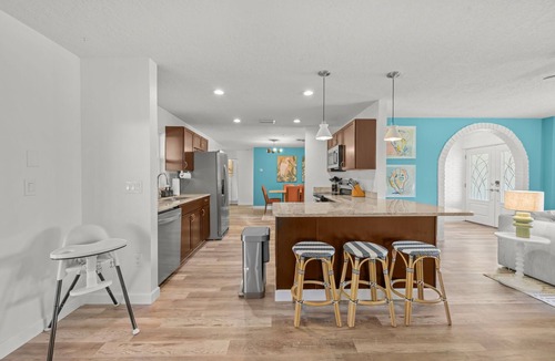 Palm Harbor House | Pool, Games & More—Fun for Everyone!