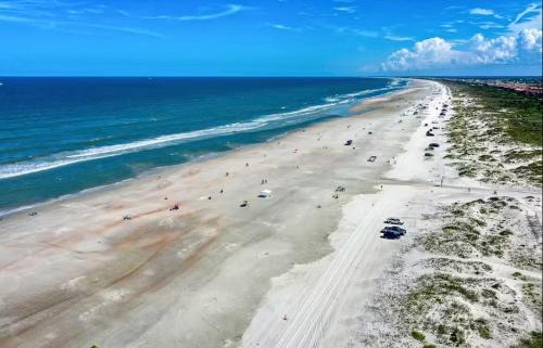 St. Augustine Beach House | Prime Location 2 Story Condo with WiFi, Shared Pool, Ocean Views, & Beach Access