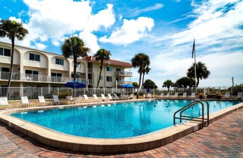 St. Augustine Beach House | Prime Location 2 Story Condo with WiFi, Shared Pool, Ocean Views, & Beach Access