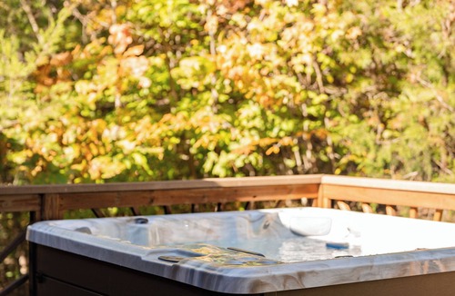 Cosby Cabin | Private and Spacious Cabin with Hot Tub, Pool Table and Arcade