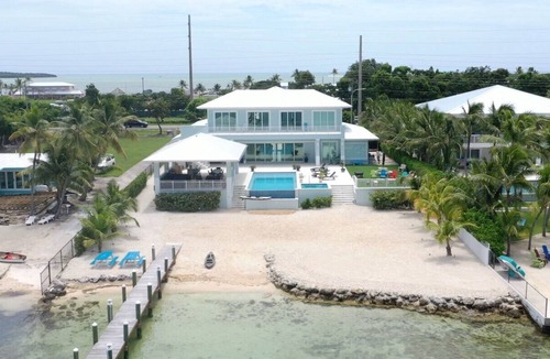 Key Largo House | Private Beach Bayside 6 Bedroom Resort Home with Pool, Dock, & Garage