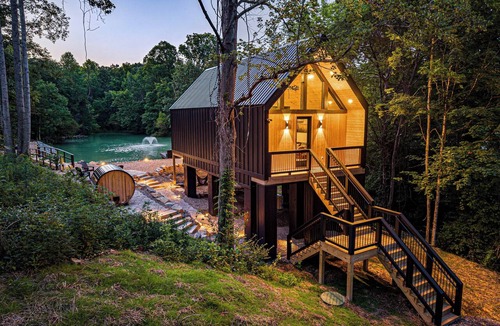 Sevierville Ski Chalet | Private Pond, Waterfall, Dock, Hot Tub, Sauna, Fire Pit, Secluded Tree House