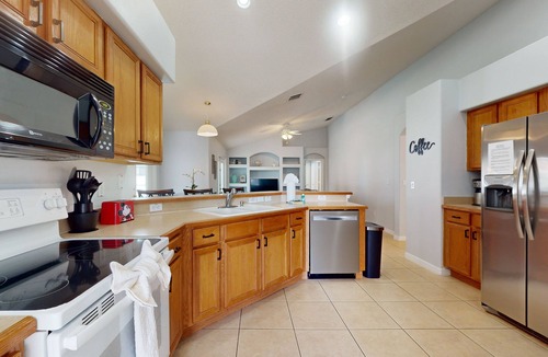 Orange Tree House | Private pool home with attached spa, screened lanai, & on-site tennis/pickleball