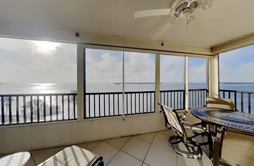 Punta Rassa Condo | Punta Rassa #404 TRANQUIL SPACIOUS 2 BED CONDO WITH GORGEOUS SUNSET WATER VIEWS