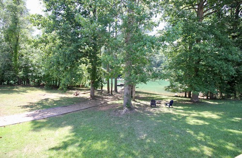 Gainesville House | Quiet lake cove home with single slip dock