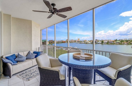 Pelican Bay Condo | Regatta at Vanderbilt, upscale condo - 8 min walk to the beach! Great Bay views!