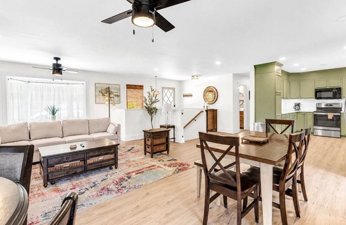 Jacksons' Gap House | Relax at this updated Lake Martin retreat with a private dock, spacious deck, firepit seating, covered patio, and bright open living spaces—perfect for lake days, family getaways, and Auburn weekends.