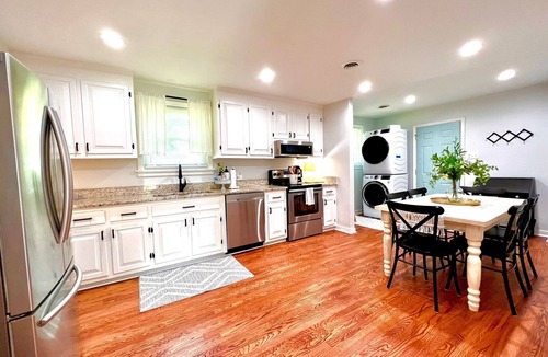 North Chesterfield Cottage | Relax in this spacious Richmond retreat featuring a private hot tub, comfortable living spaces, and easy access to downtown, shopping, dining, sporting events, and the area's top attractions.