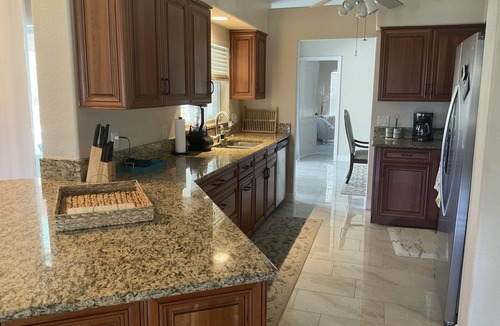 Fort Myers House | Remodeled pool home with upscale amenities and features, perfect for relaxing.