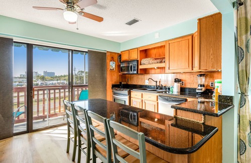 Gulf Lagoon Beach Apartment | Resort condo near beach with private balcony, WiFi, pool, tennis & dock