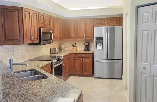 Bonita Springs Condo | Resort living-6 pools, tennis, boche and more! Lakefront unit!