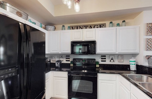 Panama City Beach Condo | Richly designed beachfront condo with pools, hot tub, gym & amazing views