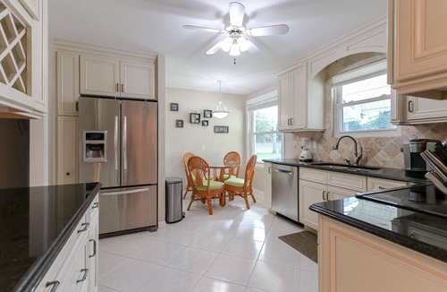 Roseland House | Riverfront Retreat, Private Docks, on Small Acreage.