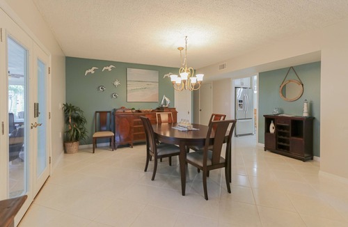 Roseland House | Riverfront Retreat, Private Docks, on Small Acreage.