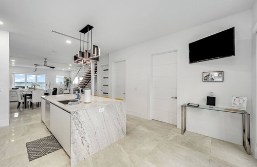 Melbourne House | Riverview Oasis- Riverfront Paradise with Dock, Elevator, Private Pool & Kayaks