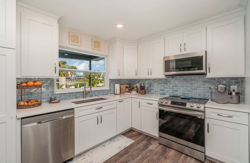 Iona House | Sailboat access. Under 15 min from Fort Myers Beach. Fire Pit and Heated Pool