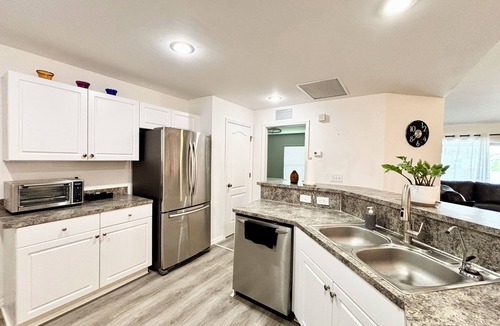 Harris House | Salt water, screened-in heated pool house and lanai