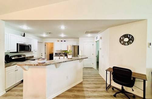 Harris House | Salt water, screened-in heated pool house and lanai